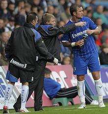 Gillingham boss Andy Hessenthaler issues instructions to Danny Kedwell.