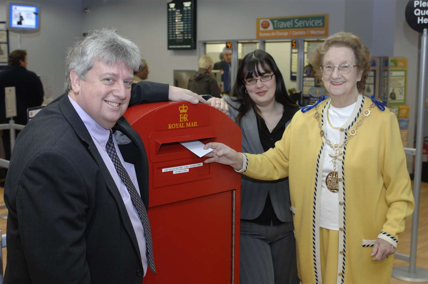 The Post Office within WH Smith in the St George's Centre, Gravesend, opened in 2008. Pictured at the opening are (from left): Post Office branch manager Phillip Willing, WH Smith store manager Danielle Delahunty, and former Gravesham Mayor Cllr Pat Oakeshott. Picture: Matthew Reading