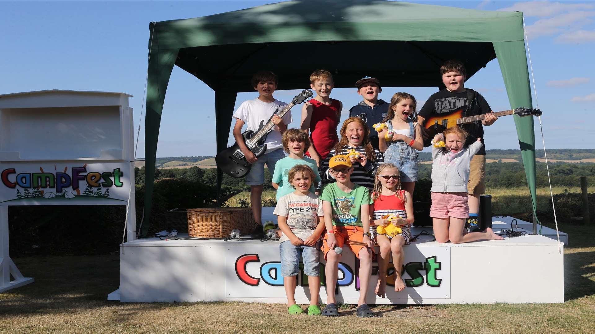 From left (front row), Finn Newman, seven, George Abrehart, 12 and his sister, Beth eight, with other friends and family members at the Campfest event