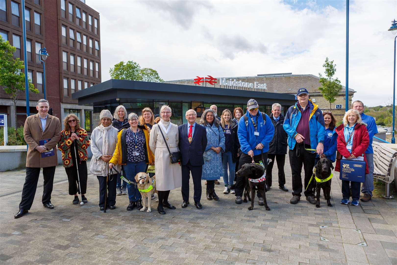 The Mayor of Maidstone, Cllr Gordon Newton, centre, with other guests and Guide Dogs volunteers and users at Maidstone East Station