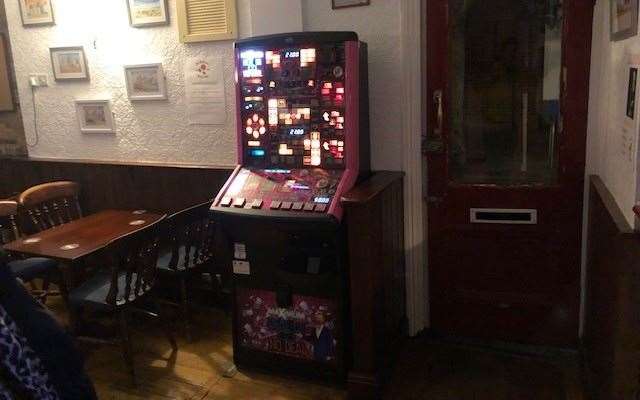 I’m not sure whether it was open, but this door alongside the fruit machine, leads to the side street