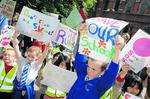 Children protest outside Tuesday's cabinet meeting