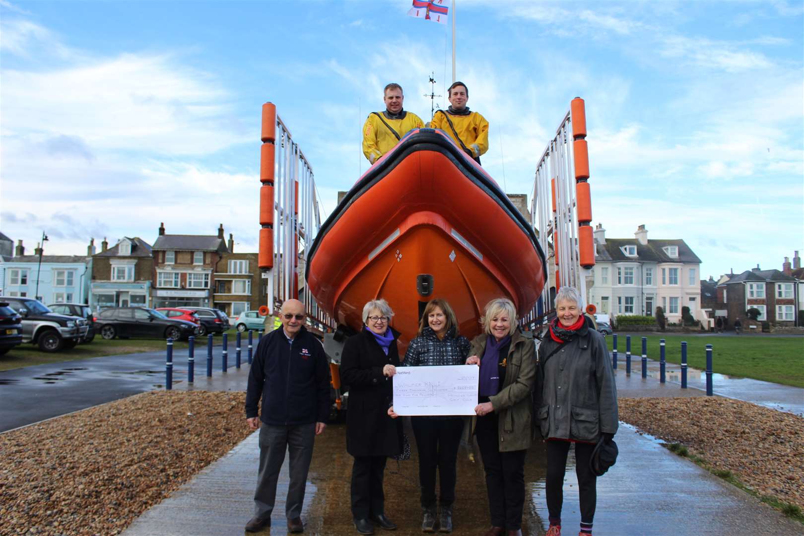 Players from Princes Ladies Golf Club present a cheque to Walmer RNLI