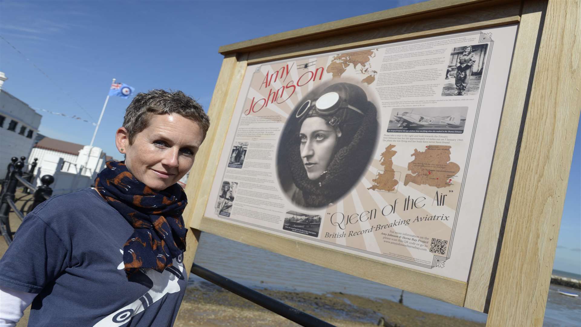 Jane Priston with the Amy Johnson memorial board at Herne Bay Pier