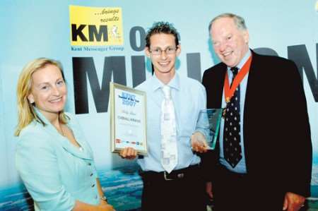 Kent Teacher of the Year 2007 Philip Burns receives his award from Kent Messenger Group chairman Geraldine Allinson and Kent County Council chairman Leyland Ridings.