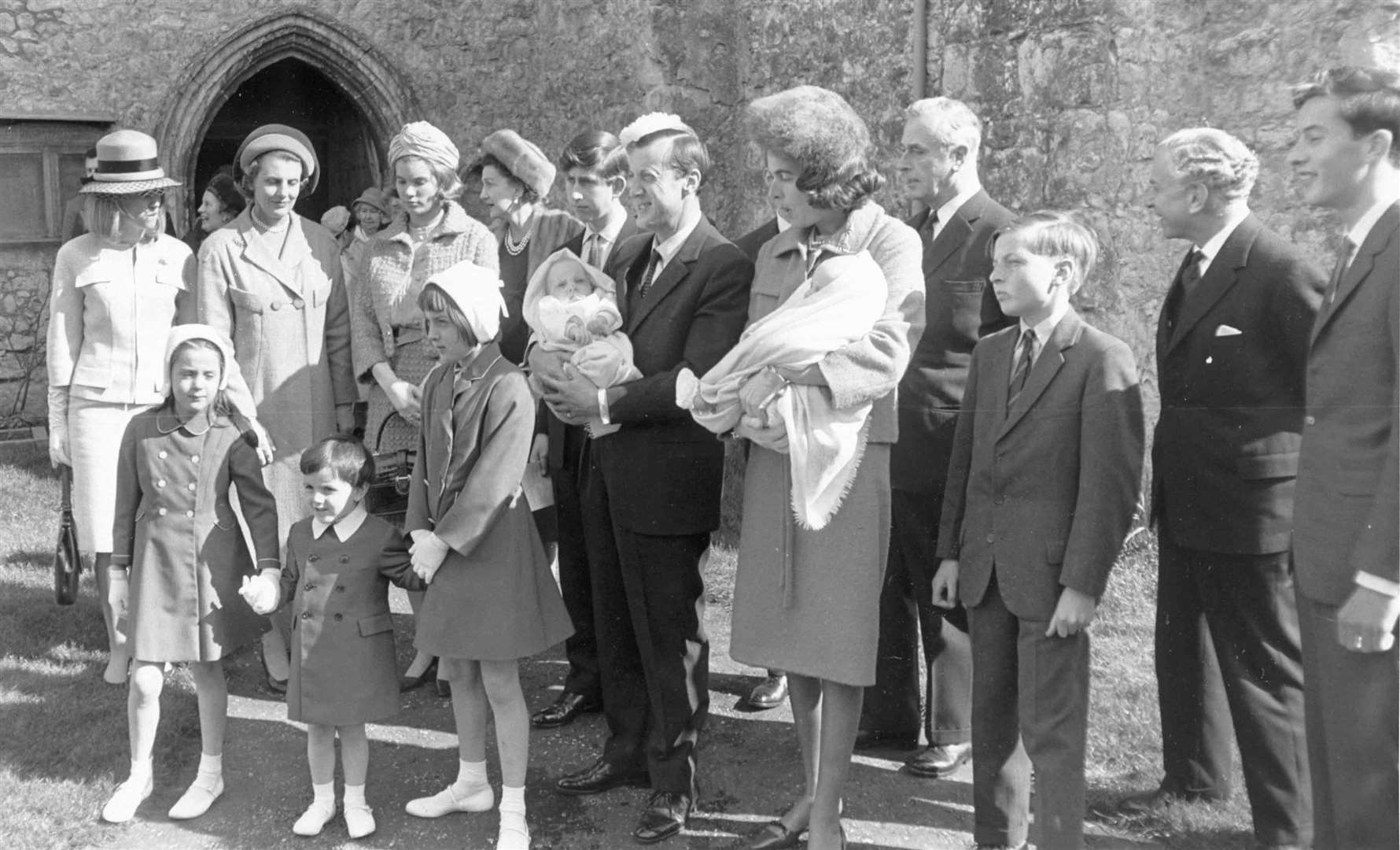 Prince Charles stood as godfather to Nicholas and Timothy, twin five-month-old sons of Lord and Lady Brabourne, at Mersham Church in April 1965