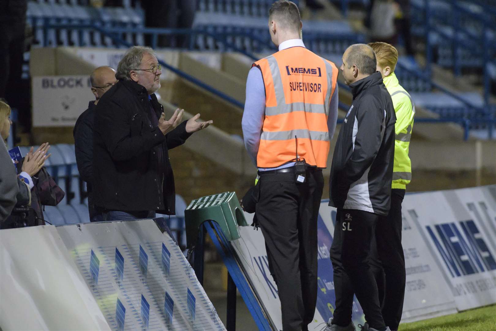 Manager Steve Lovell chats with a disgruntled fan after the whistle following Tuesday's defeat to Rotherham Picture: Andy Payton