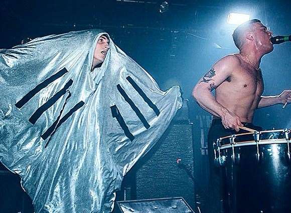 Singer Isaac Holman is herranged by a giant mantaray during a performance of Feed The Mantaray. Picture: @IsaacSlaves