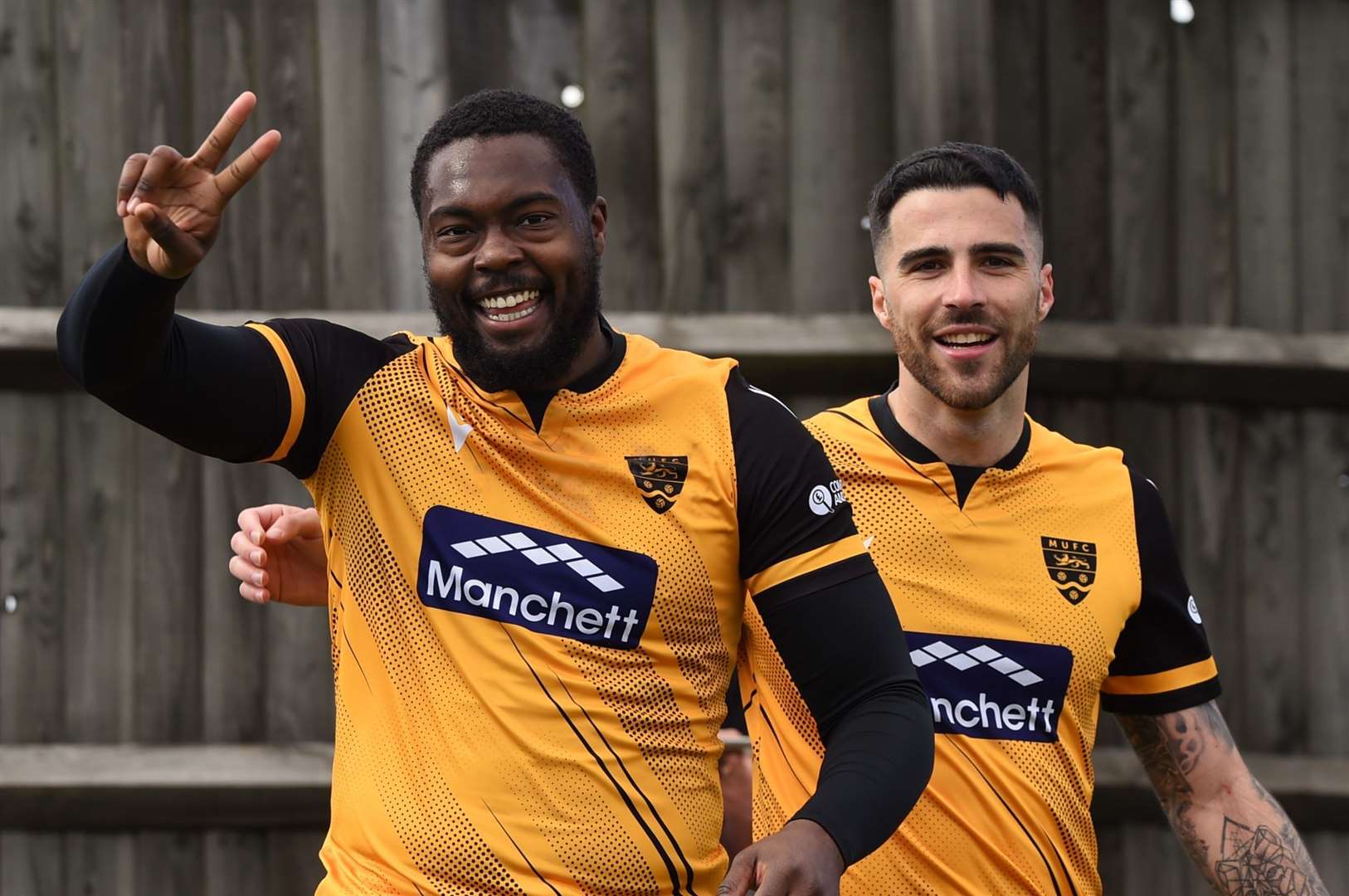 Jerome Binnom-Williams celebrates his goal at Chippenham with Joan Luque Picture: Steve Terrell