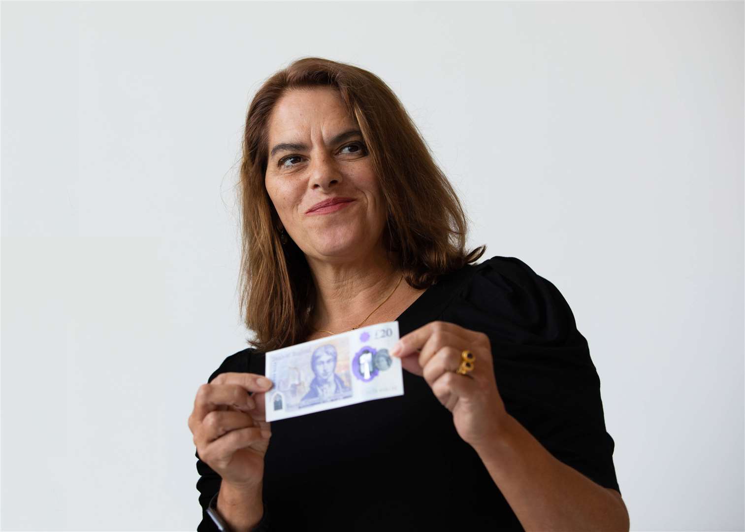 Artist Tracey Emin with the new £20 note which is harder to fake and should last longer. Picture: Bank of England.