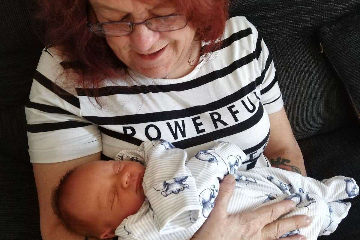 Sue Cairns with her newborn granddaughter