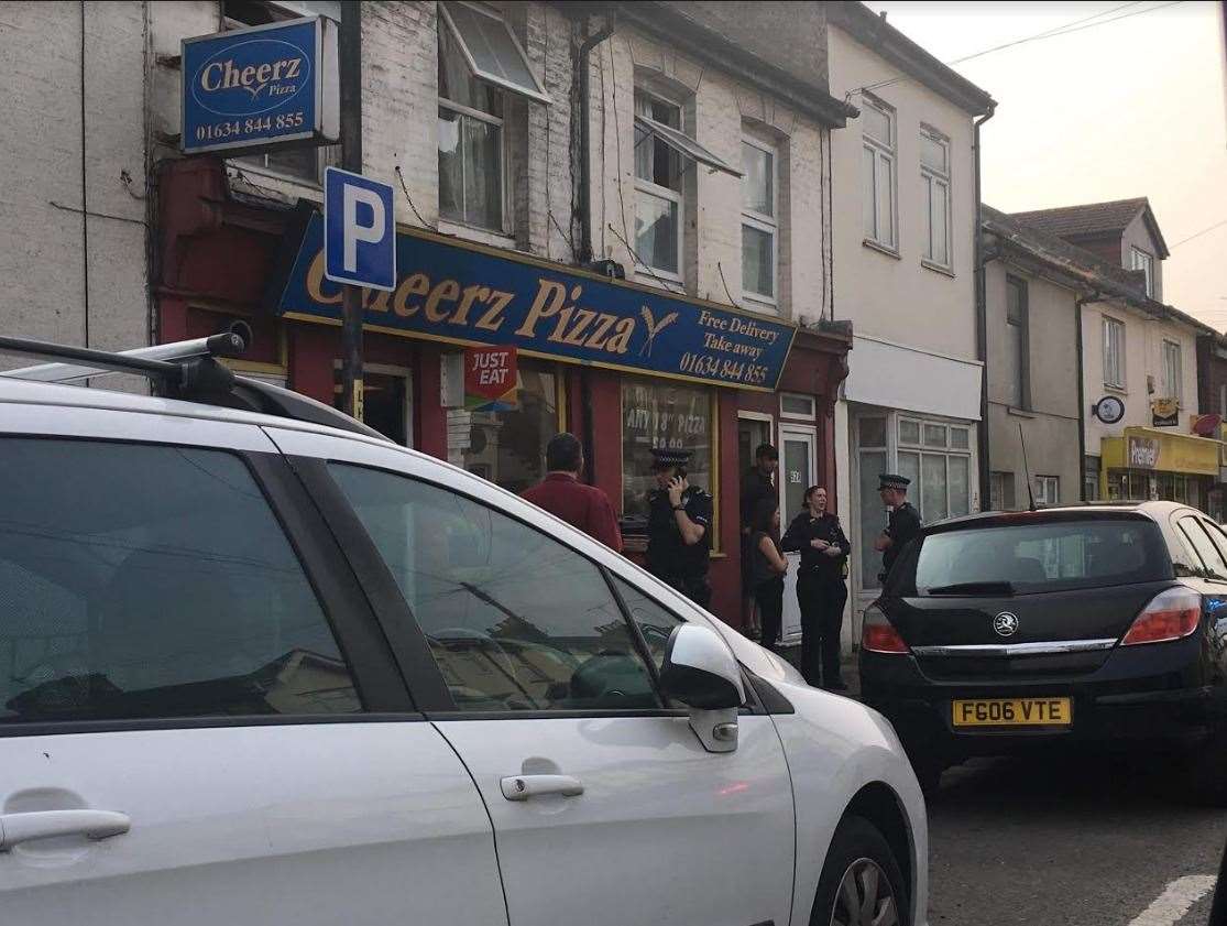 Forensic and police officers were outside Cheerz Pizza takeaway in Luton Road, Chatham (8383722)
