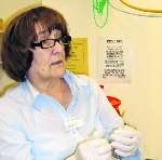 Consultant nurse, Margaret Gurney preparing a botox injection