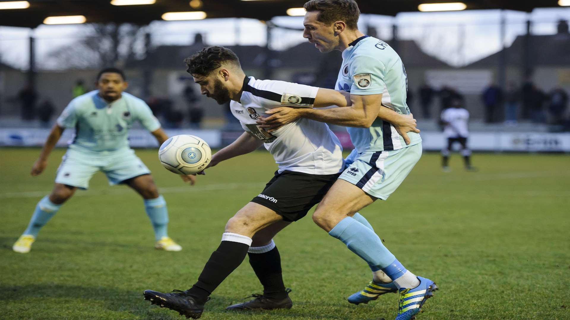 Dartford's Alex Brown holds off former Dart Tom Champion in the first half. Picture: Andy Payton