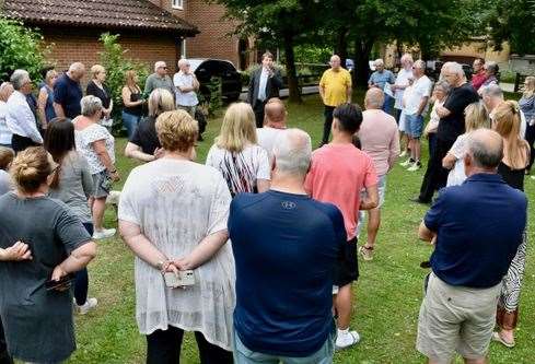 Residents gather in their treasured green space