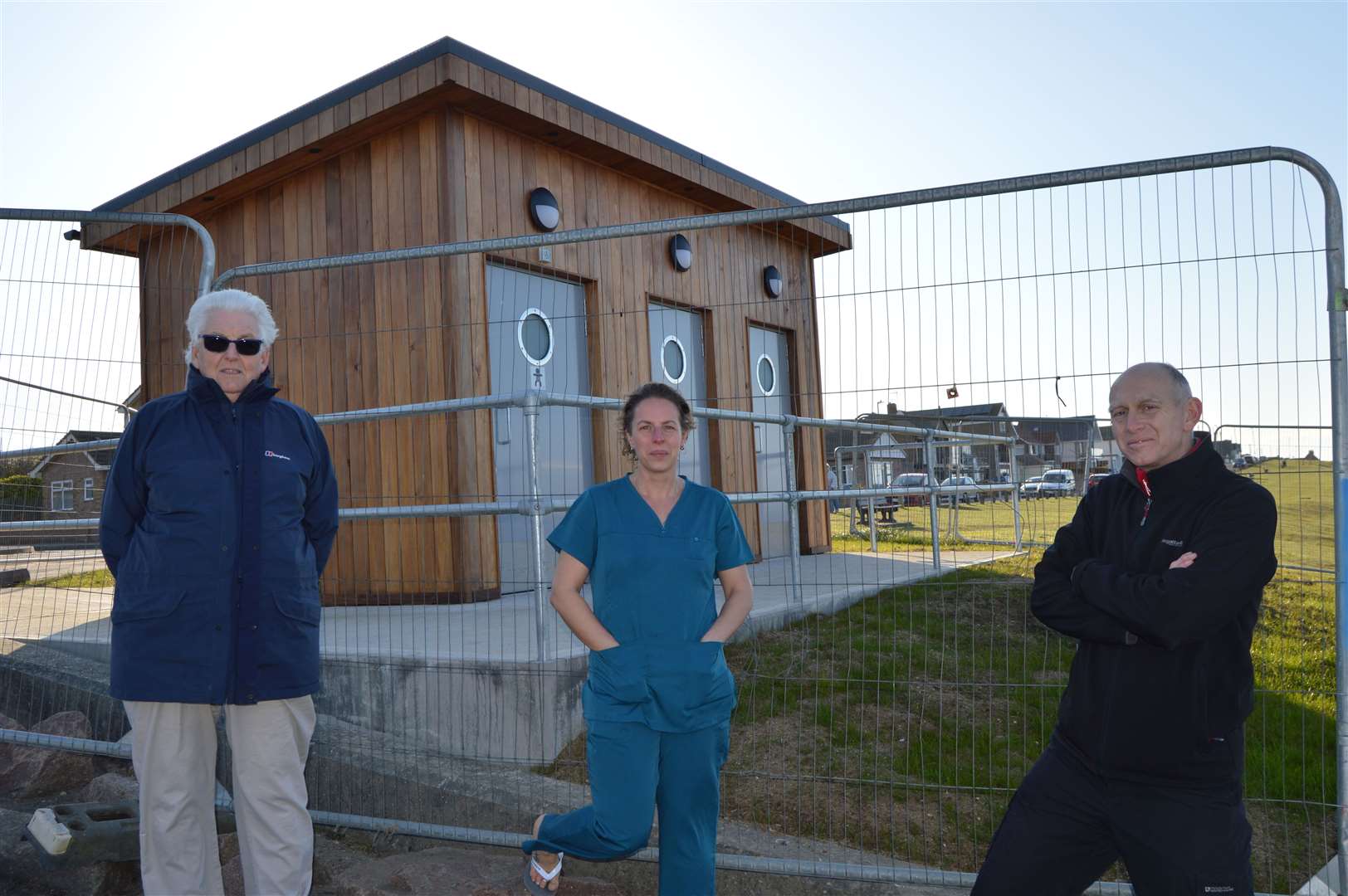 Loo protesters: Geoff Harris, left, Heidi Martin and Neil West in front of the new toilet block on The Leas at Minster, Sheppey. Picture: Tracy West