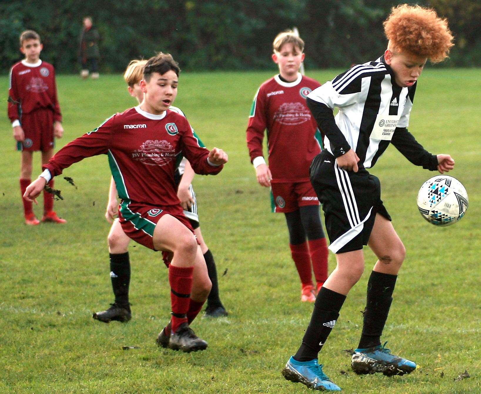 Real 60 under-14s in possession against Cobham Colts under-14s. Picture: Phil Lee FM22430390