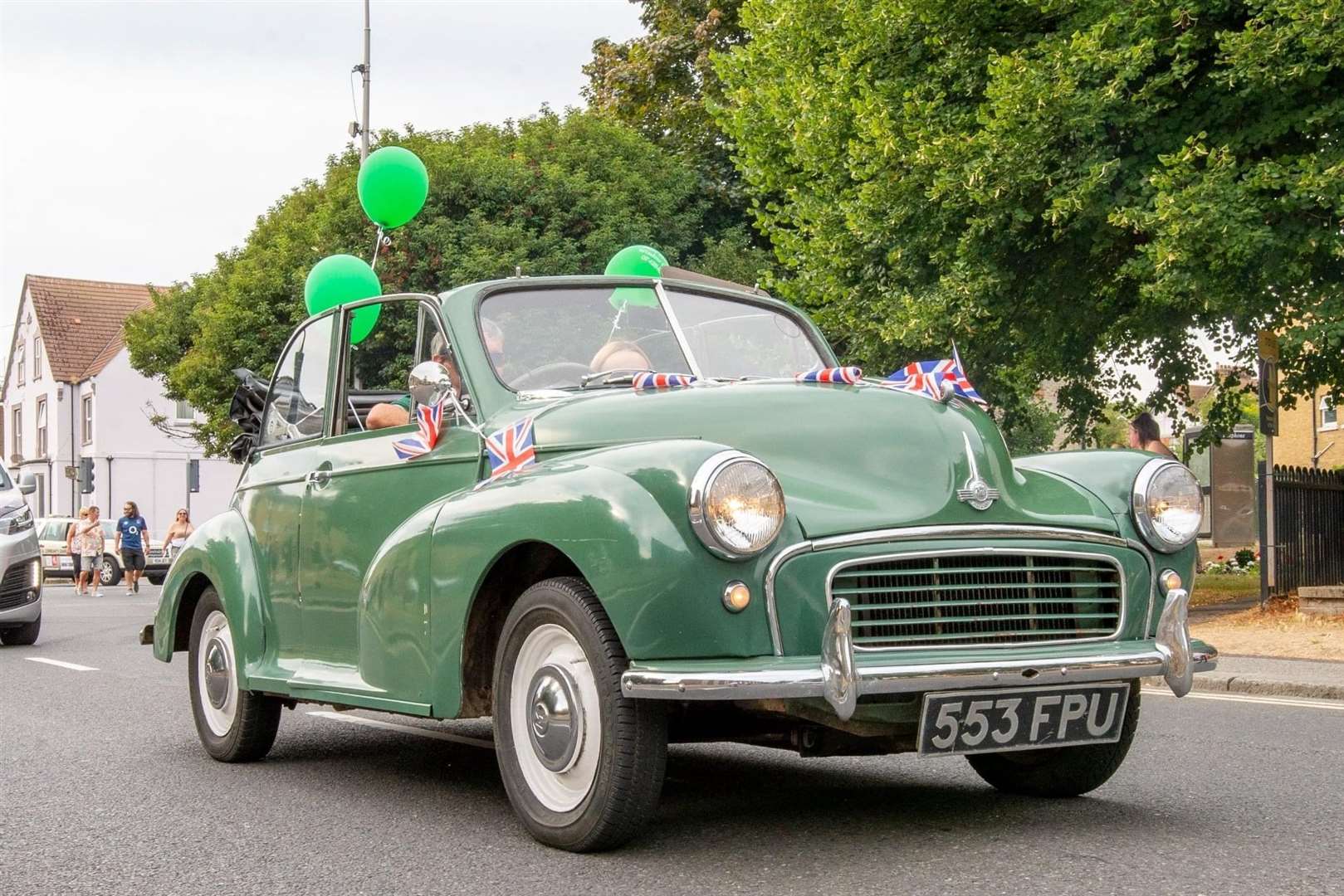 One of the classic cars in the procession, a Morris Minor. Picture: Susan Preston