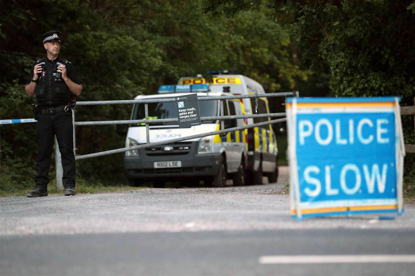 Police at the scene at Havant Thicket (Jonathan Brady/PA)