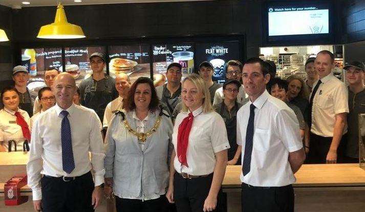 Franchisee Paul Crockfield, left, with Dover mayor Sue Jones and the restaurant team. Picture: McDonald's