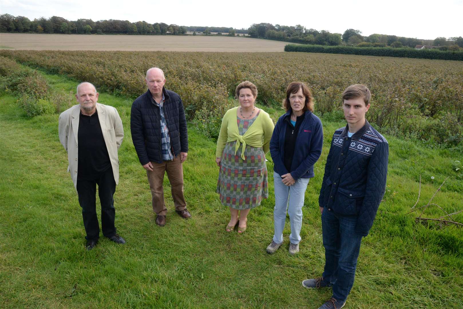 Dave Howe, left, and fellow residents Mike Sole, Camilla Presland, Penny Morgan and Jack Lowe, who are concerned over plans for 175 holiday homes on land at Highland Court Farm. Picture: Chris Davey