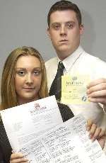 PARKING HASSLE: Holly Jackson and Jason Robling with penalty tickets and a parknig permit. Picture: ANDY PAYTON