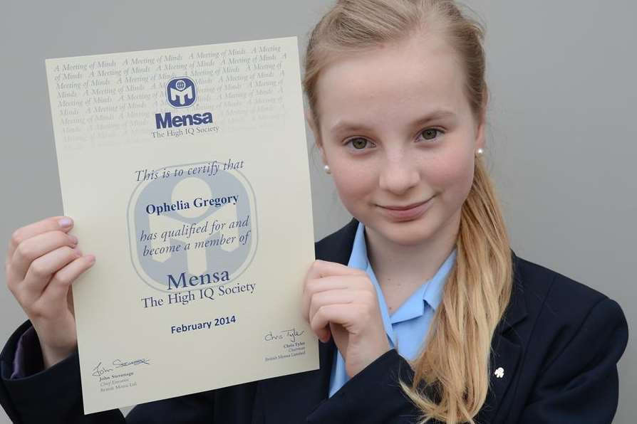 Schoolgirl Ophelia Gregory with her Mensa certificate