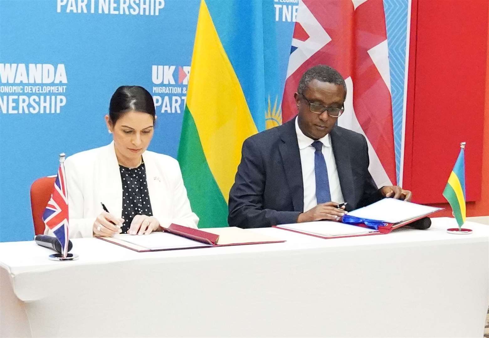 Home Secretary Priti Patel and the Rwandan minister for foreign affairs and international co-operation, Vincent Biruta, signed a ‘world-first’ migration and economic development partnership in the East African nation’s capital Kigali (Flora Thompson/PA)