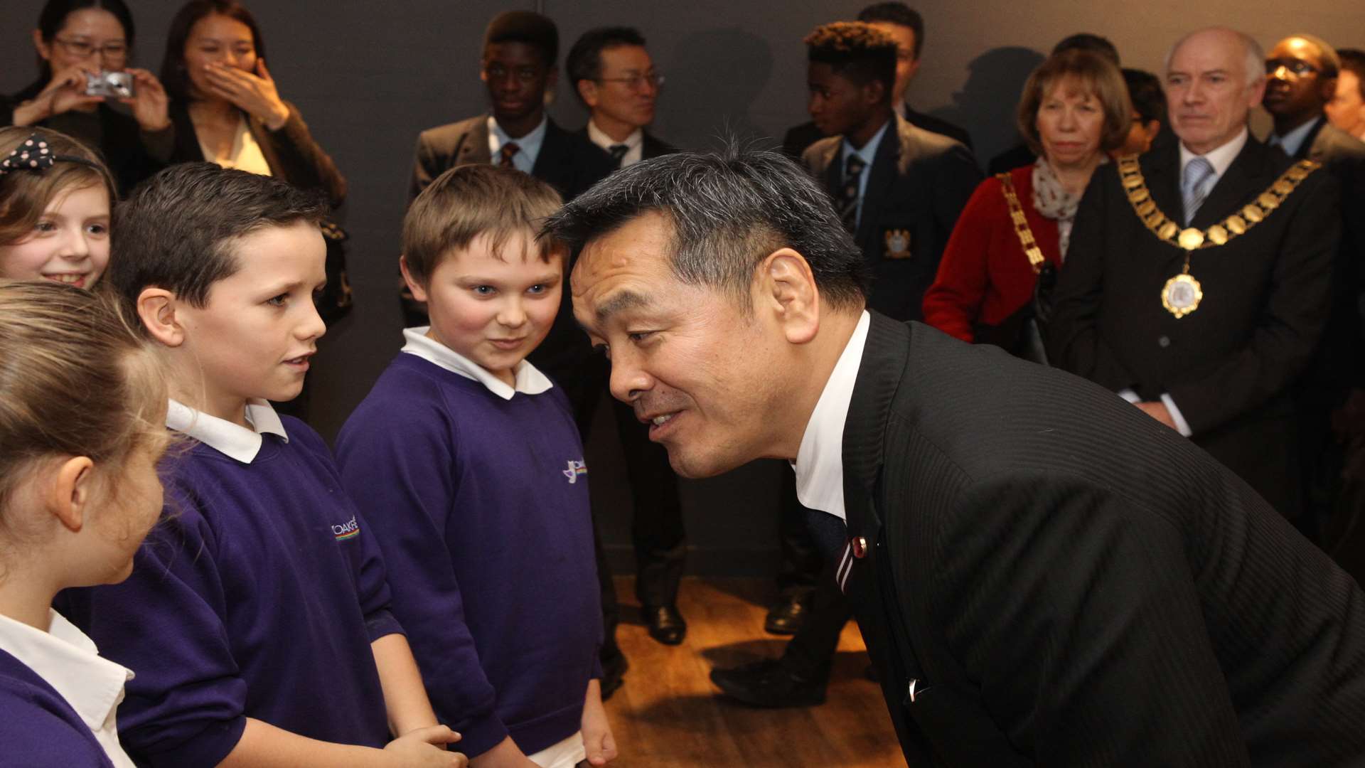 Mr Hase talks to Oakfield Primary School at the opening of a new canteen at Dartford Grammar School.