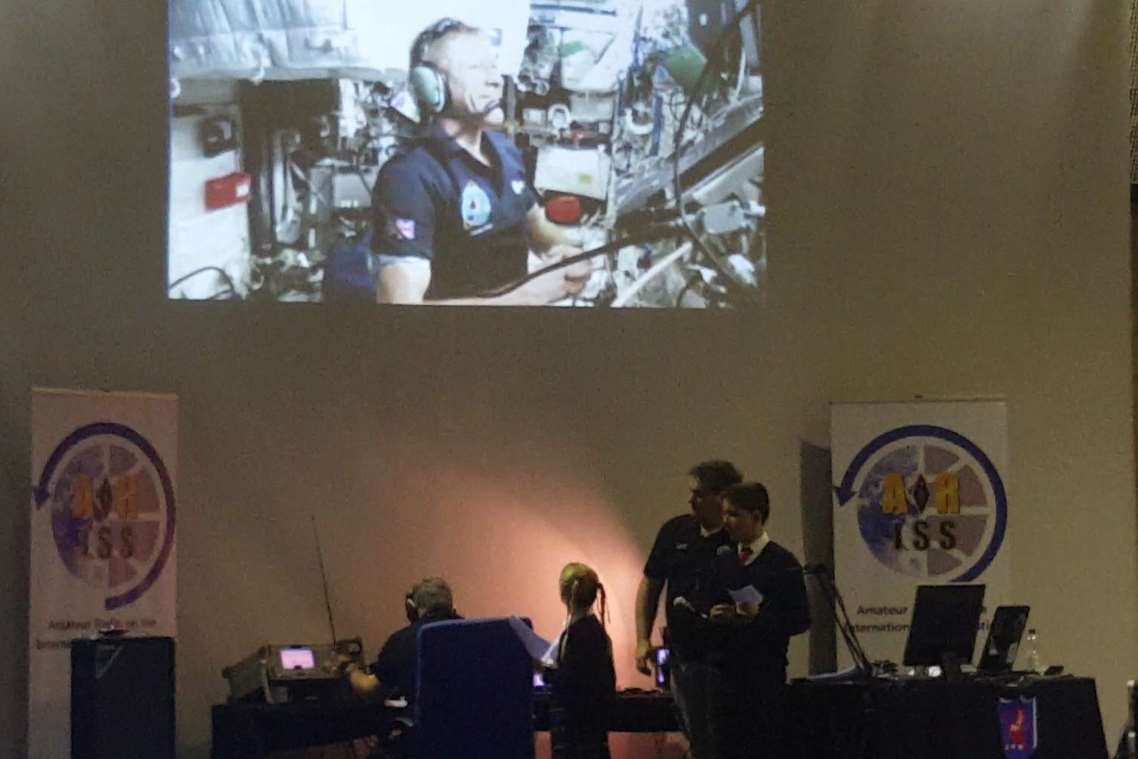 Tim Peake smiles as he's asked a question about Shakespeare by seven-year-old Scarlet from Wellesley House School