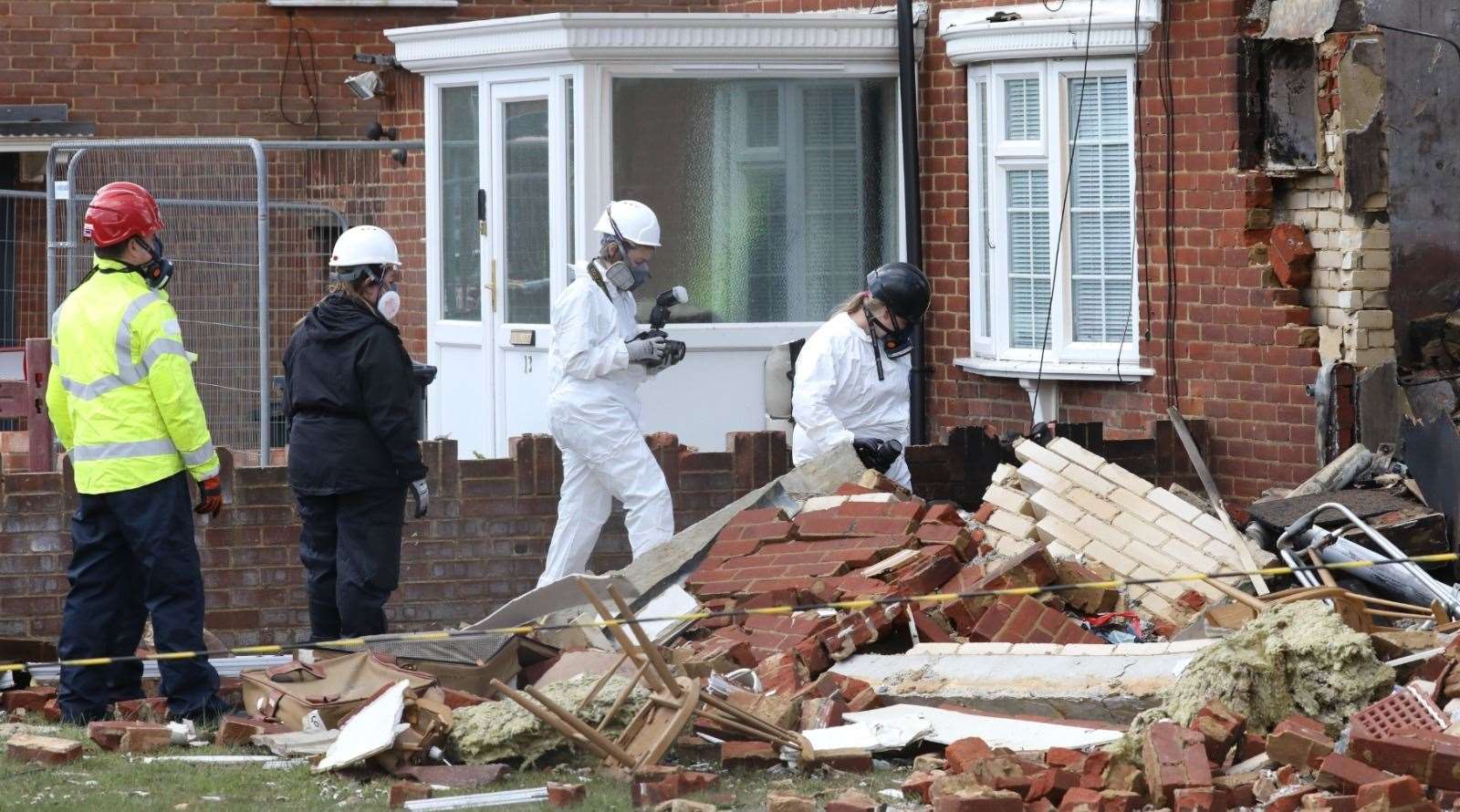 Forensics at the scene of the explosion in Mill View