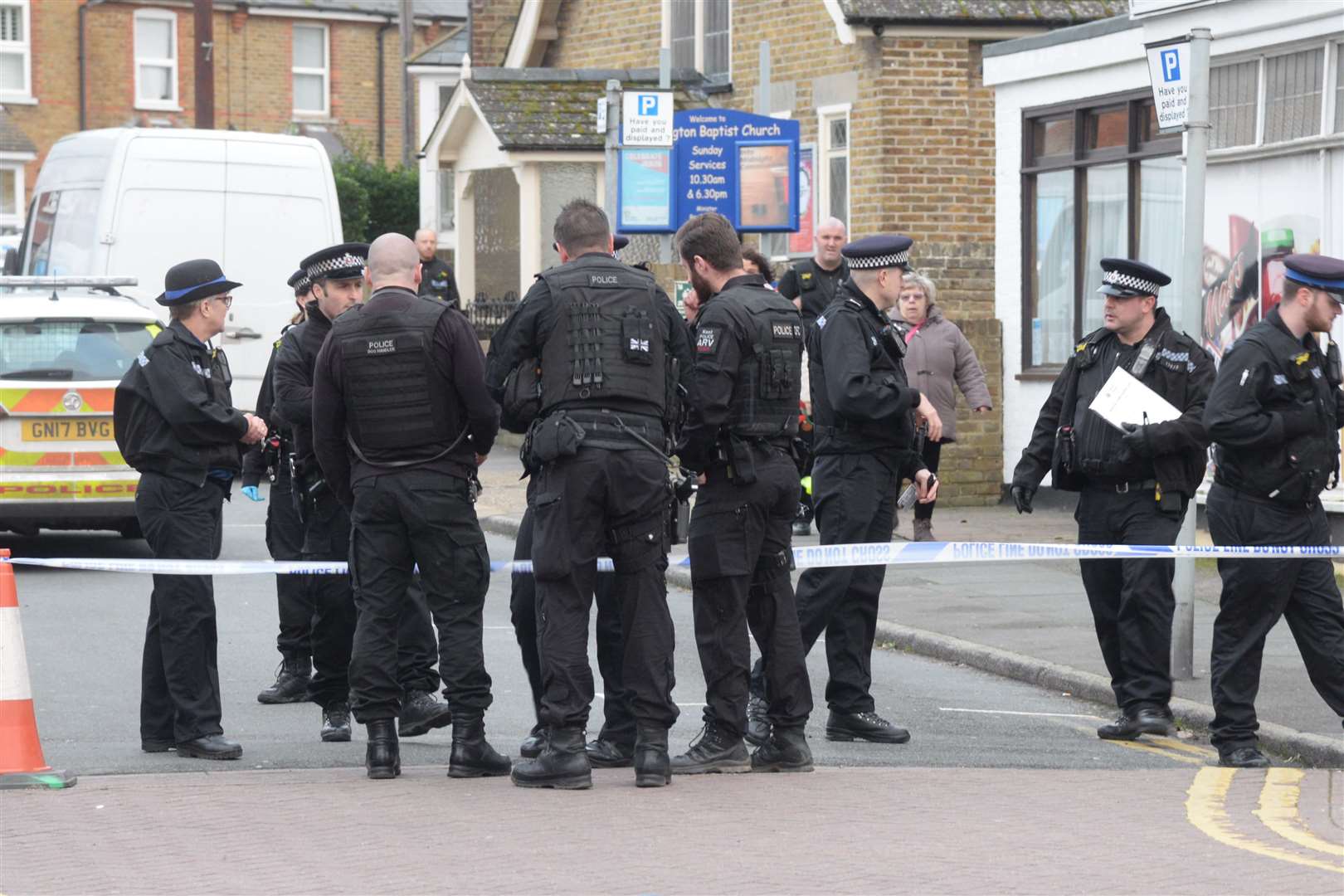 Firearms and other officers as detectives launch an investigation