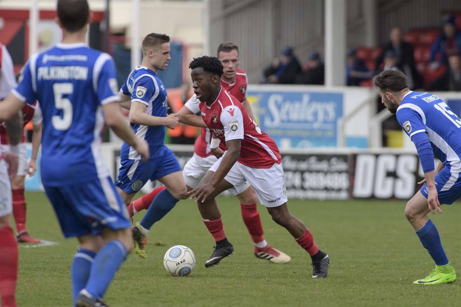 Norman Wabo looks to cause havoc in the Macclesfield defence Picture: Andy Payton