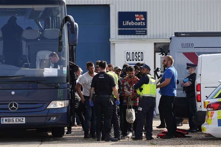 The group was taken by coach to a processing centre. Image: Gareth Fuller/PA