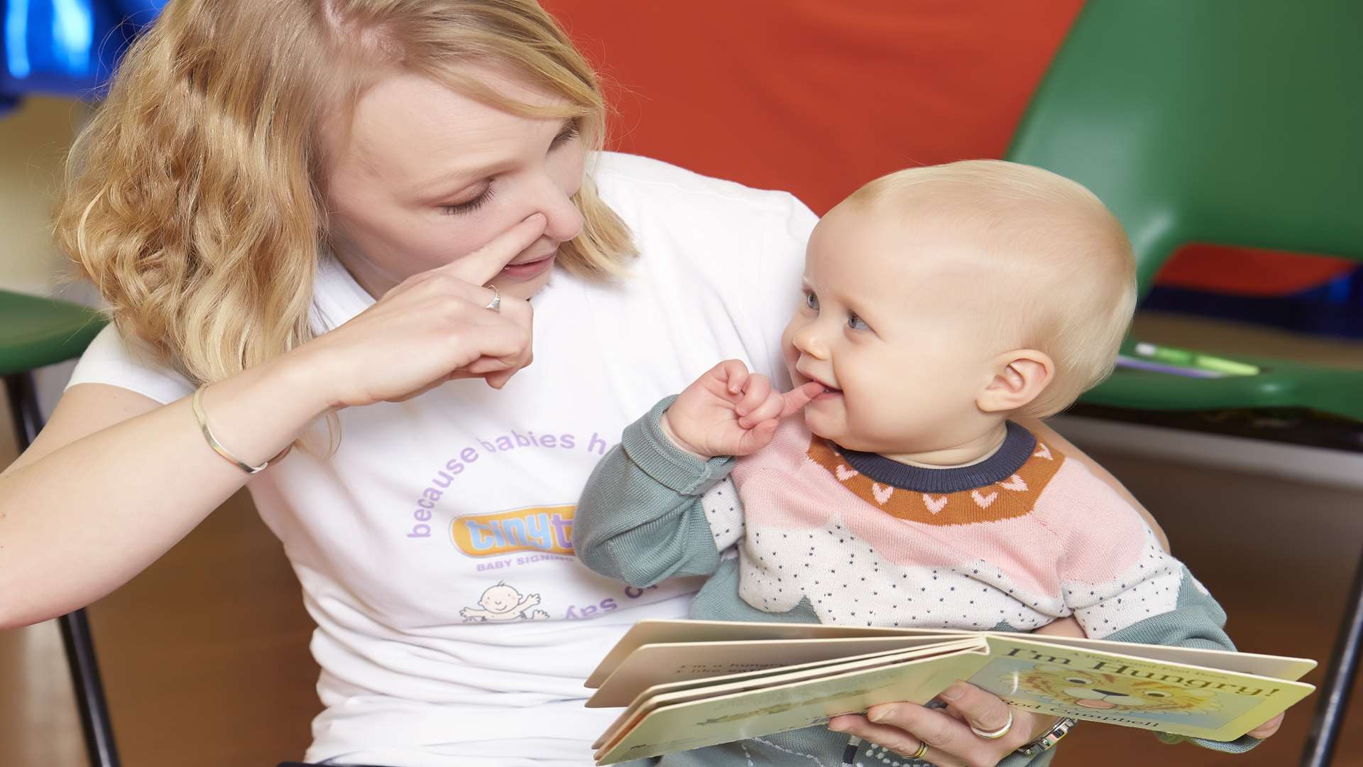 Mum Rebecca Oakley teaches baby sign language through Tiny Talk. Picture: npower