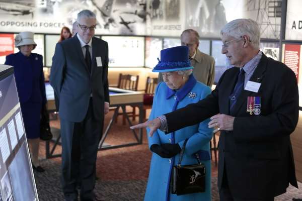 Her Majesty is shown around the museum