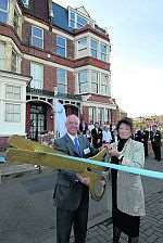 Cllr Zita Wiltshire, Thanet District Council's cabinet member for housing, cuts the ribbon at 77 Eastern Esplanade, Cliftonville, helped by Jon Rosser, chief executive of Town & Country Housing Group.