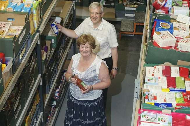 Warehouse manager Kevin Jennings and volunteer Sandra Wyatt