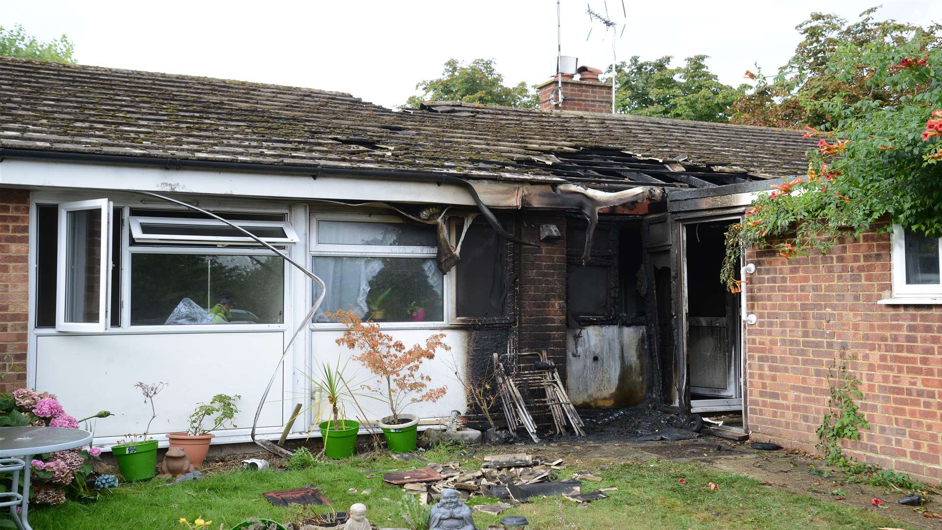 Scene of the fire damaged bungalow in Goldwell Close. Pic by Gary Browne