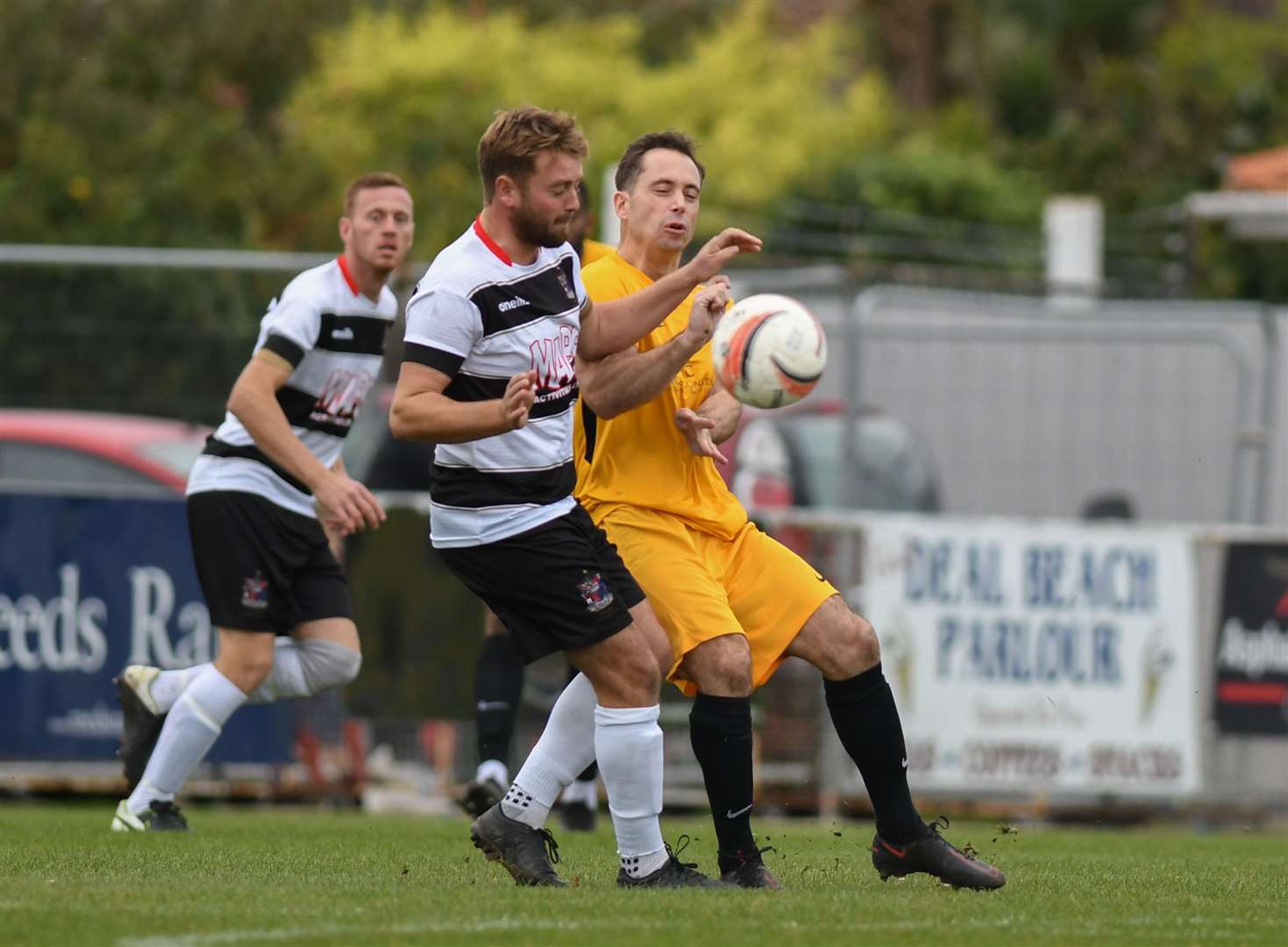 Deal and Kennington battle for the ball in the Hoops' 4-0 FA Vase win on Saturday. Picture: Paul Davies