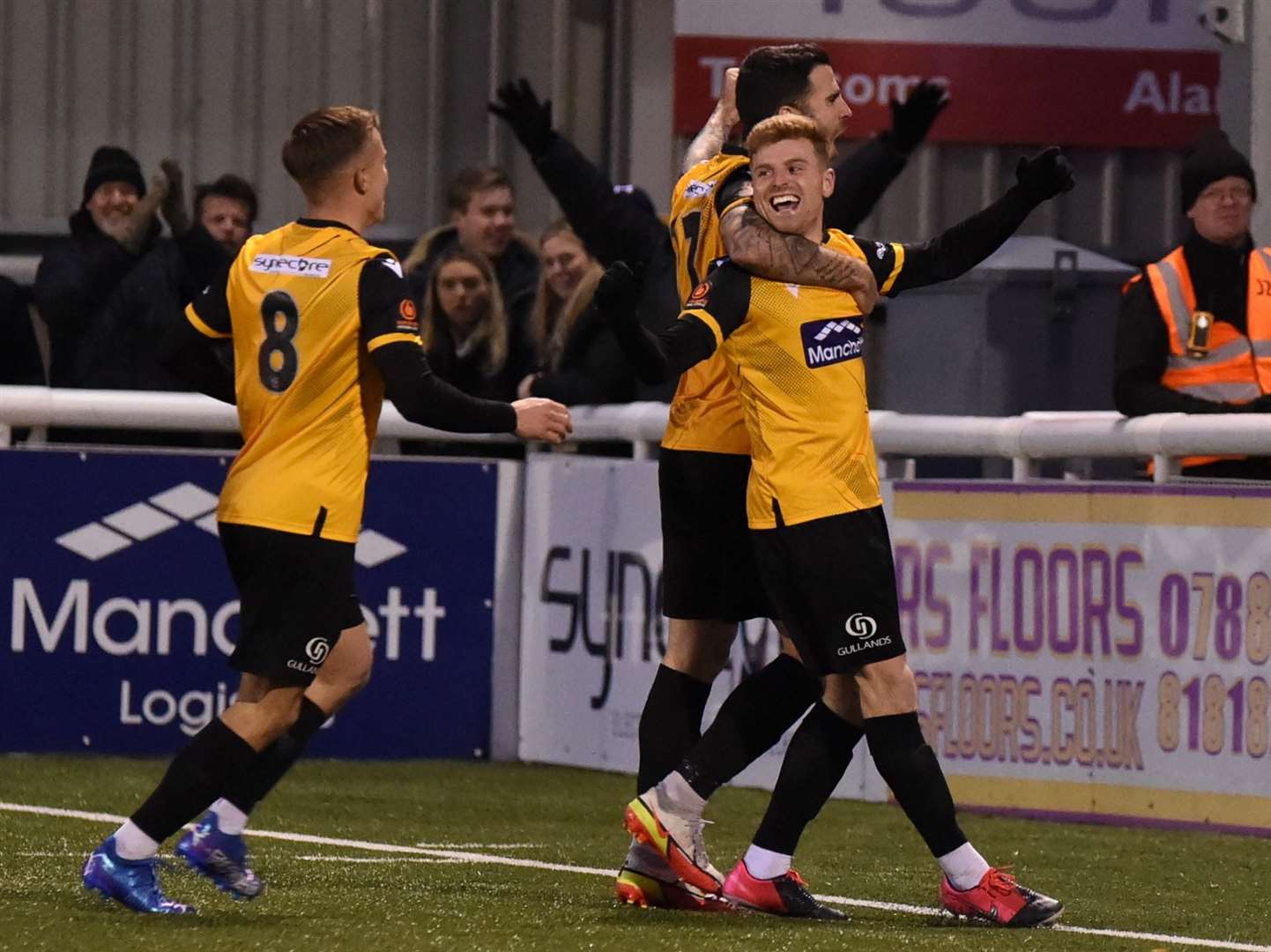 Jack Barham celebrates Maidstone's third goal with Joan Luque and Sam Corne Picture: Steve Terrell