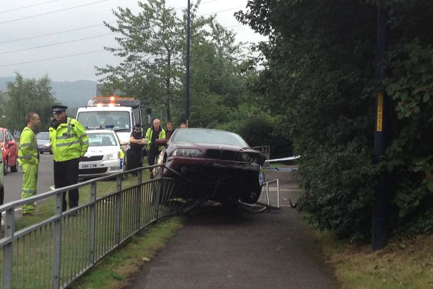 The BMW on the railings this morning