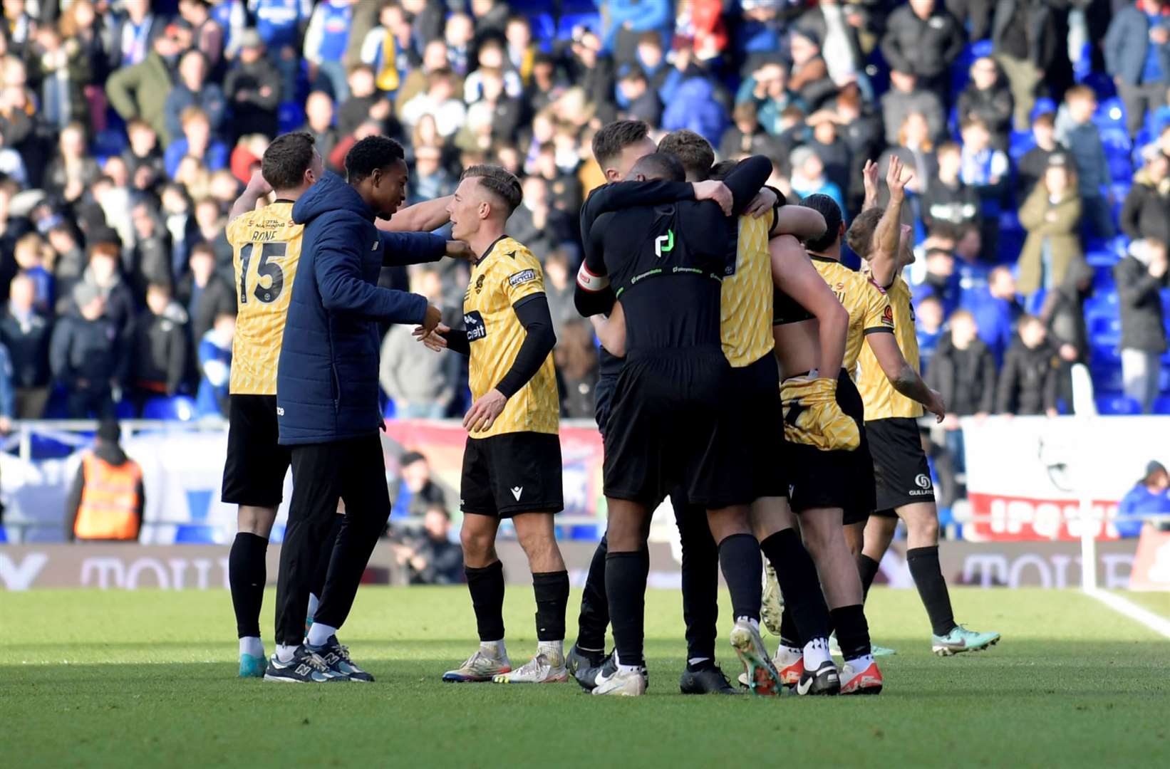Maidstone United players celebrating at Portman Road. Picture: Barry Goodwin