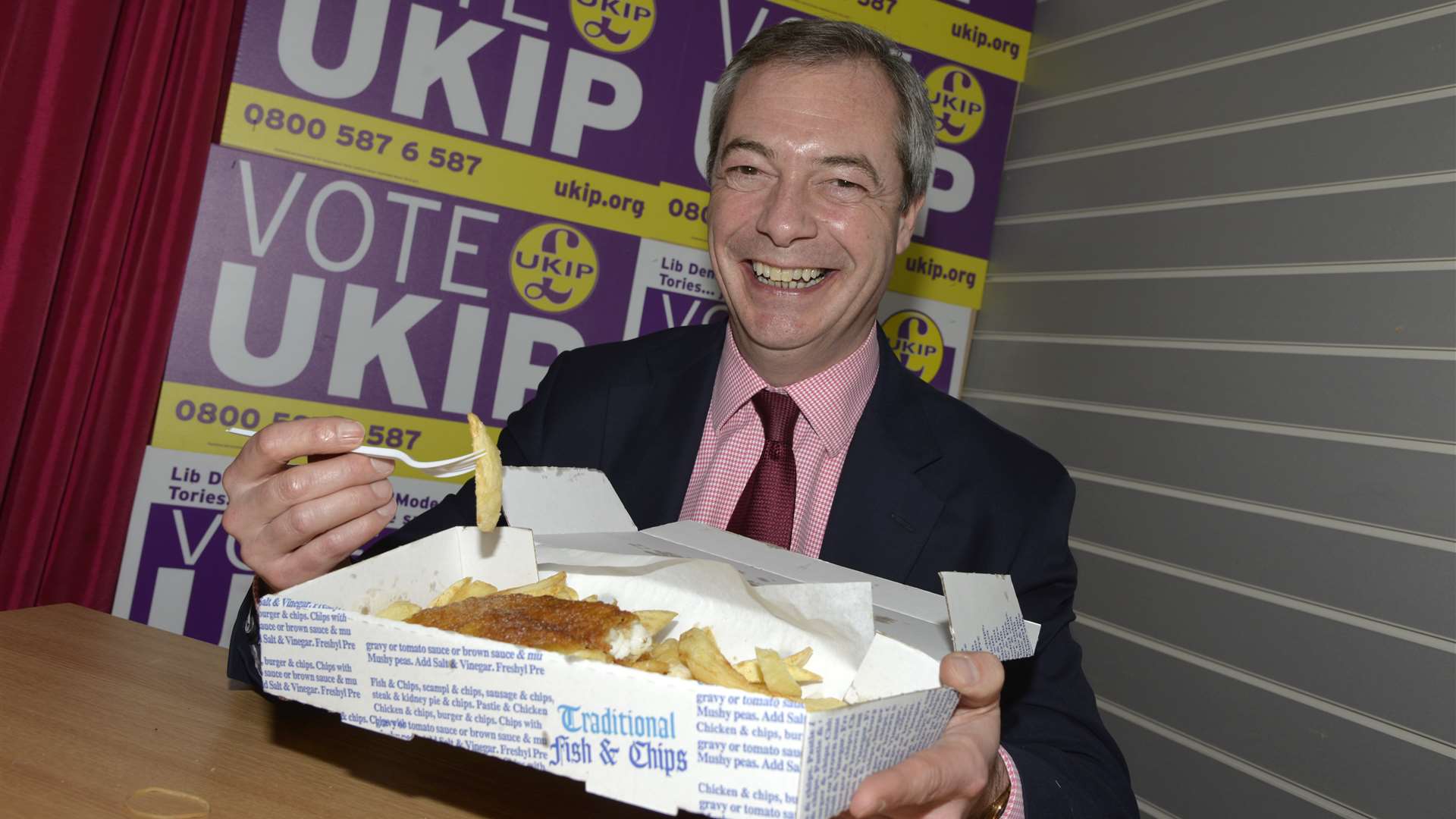 Ukip leader Nigel Farage enjoying fish and chips for lunch