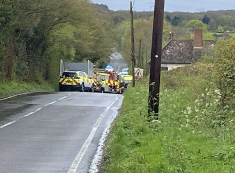 Police and fire crews at the scene of a crash near The George Inn pub on Stone Street, near Stelling Minnis