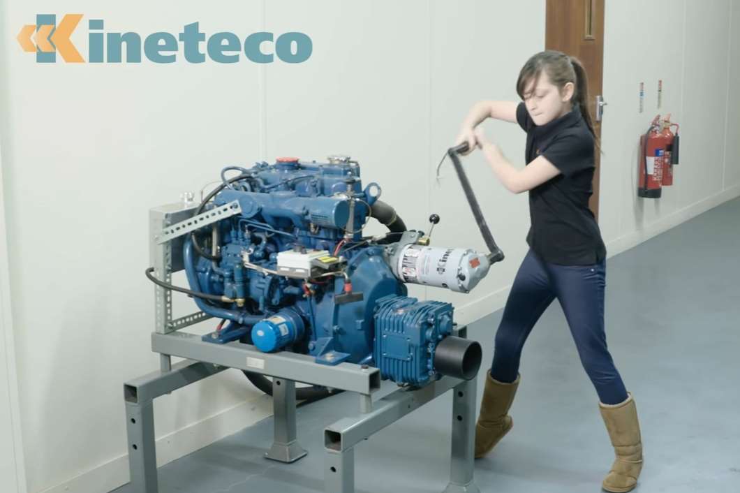 Kira Harris, then aged 10, shows engineer Ollie how to use a spring starter made by Kineteco in Ashford
