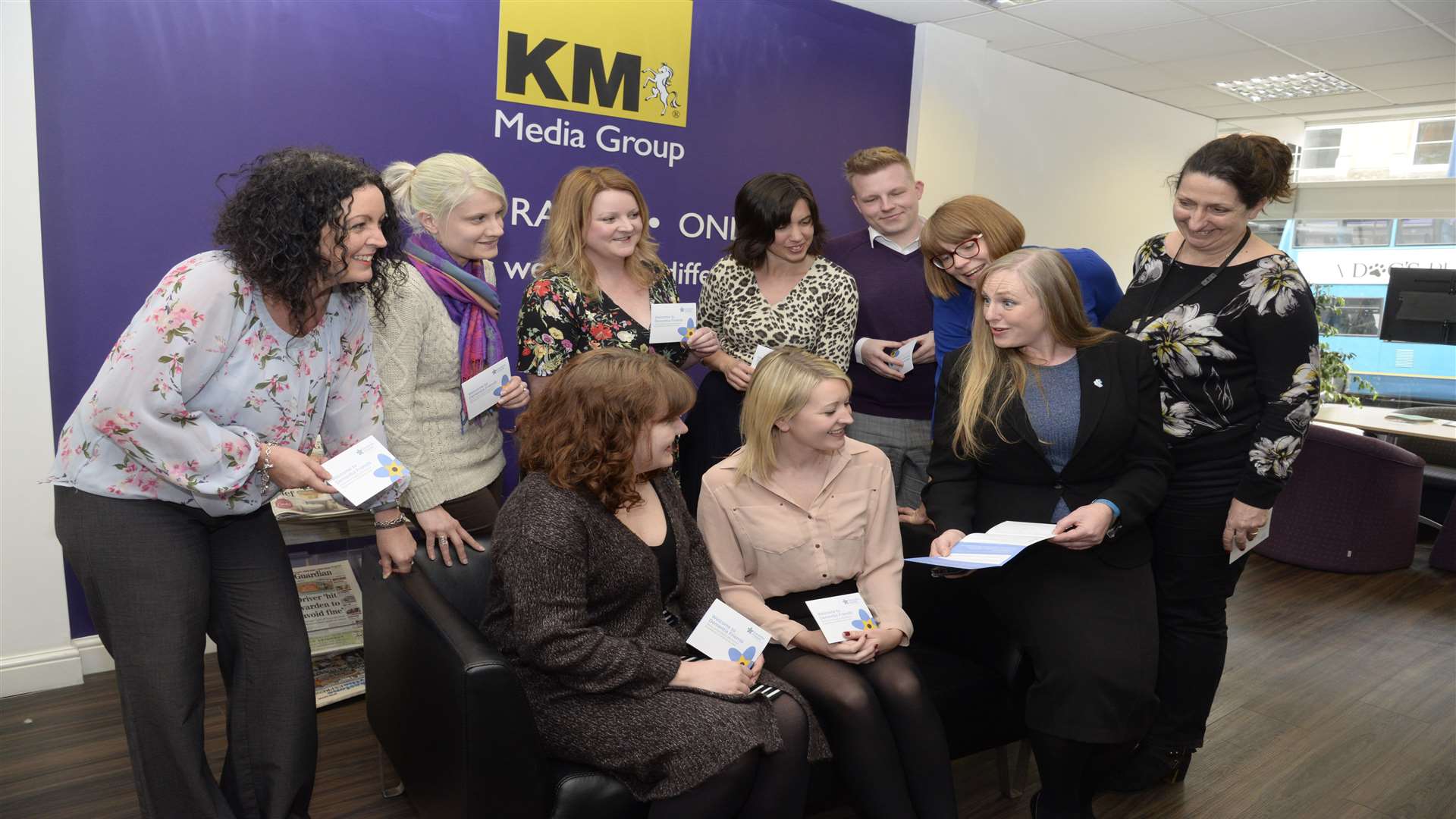 KM staff with Denise Wilton, right front, of the Alzheimer's Society at the Dementia Friends session