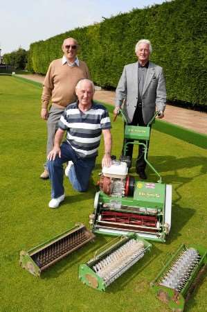 Brian Hubbard, Terry Tonks and Arthur Hockley with the bowling club's new mower