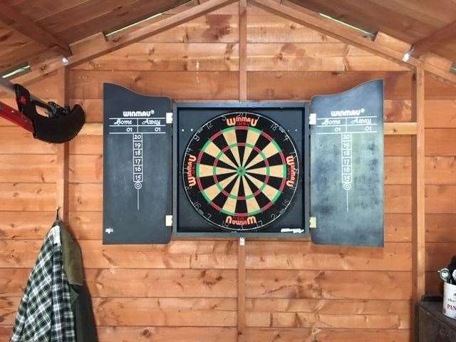 The dartboard is set at exactly the right height but take care the extendable lopping saw doesn’t fall down on you