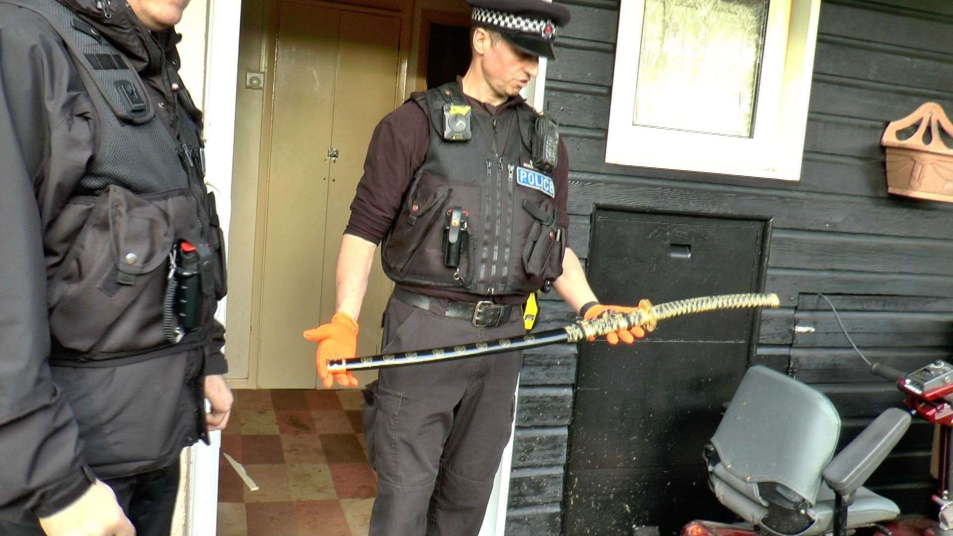 Police raid a house in Maidstone and find a Samurai Sword (7987867)